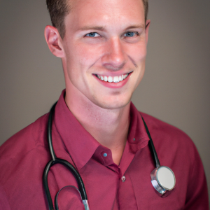 a professional and visually appealing image of a young happy smiling caucasian doctor with white teeth