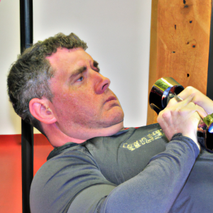 a professional appealing image of a caucasian man or woman exercising in a gym