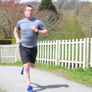 a professional appealing image of a caucasian man or woman jogging on a sunny day 206 300x300