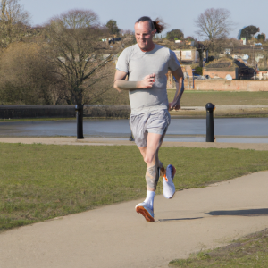 a professional appealing image of a caucasian man or woman jogging on a sunny day 548 300x300