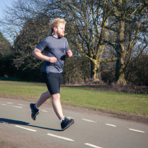 a professional appealing image of a caucasian man or woman jogging on a sunny day 649 300x300