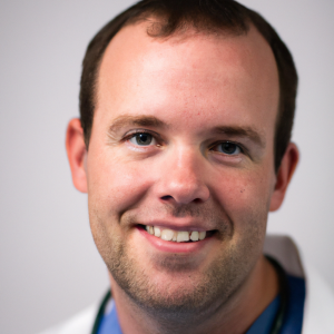 a professional and visually appealing image of a young happy smiling caucasian doctor with white teeth 319 300x300