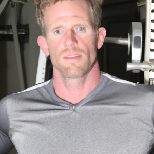 a professional appealing good looking and atheletic image of a caucasian man exercising in a gym